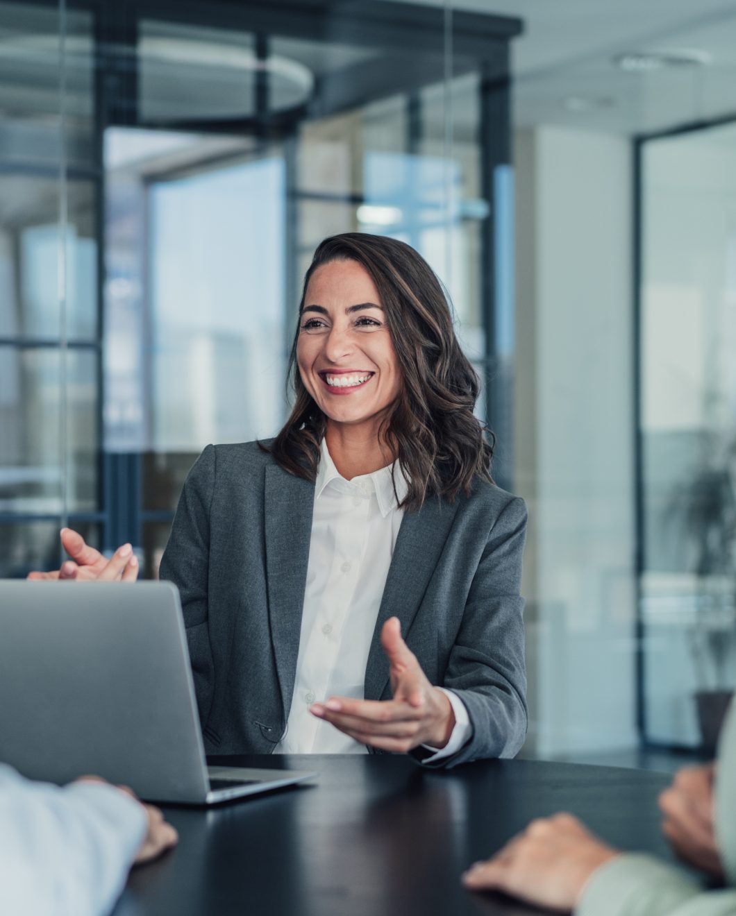 Group of business persons talking in the office.
